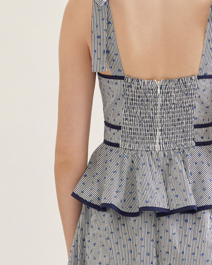 Floral Peplum Midi Dress in Navy Dresses in at Wrapsody