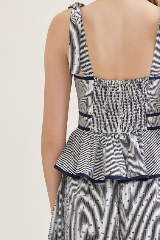 Floral Peplum Midi Dress in Navy Dresses in at Wrapsody