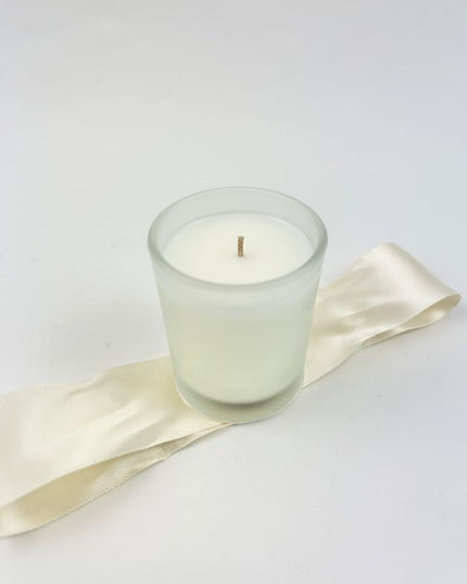 B's Knees Votive in Gardenia Candles in  at Wrapsody