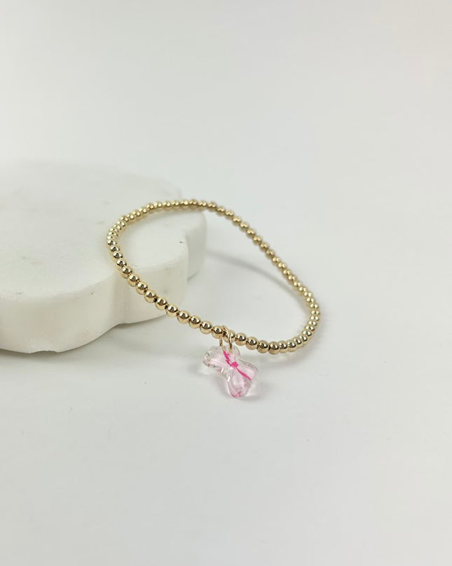 Beaded Blondes Pink Bow Charm Bracelet Bracelets in at Wrapsody