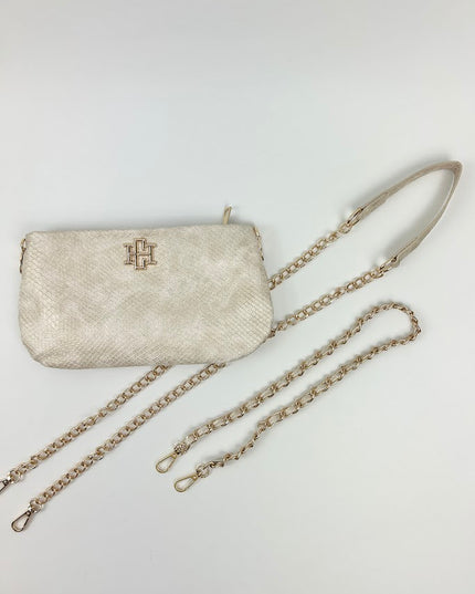 Livi Shimmer Champagne Crossbody Handbags in at Wrapsody