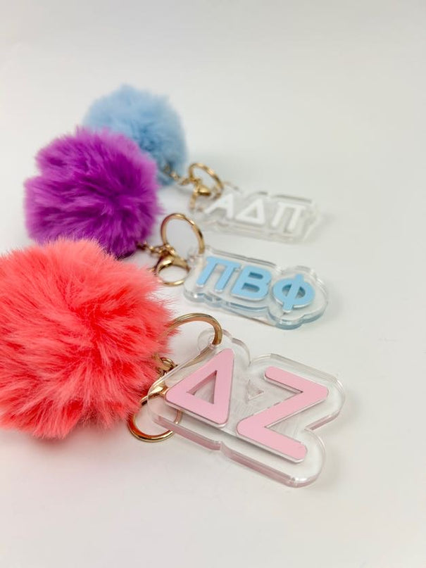 PomPom Acrylic Keychain Greek in  at Wrapsody