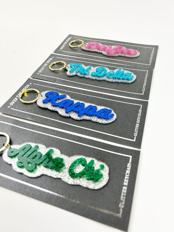 Glitter Keychain Greek in  at Wrapsody