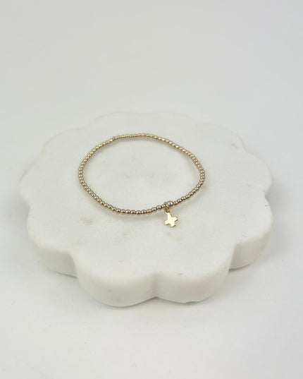 eGirl Signature Cross Small Charm 2mm Gold Bracelet Bracelets in at Wrapsody