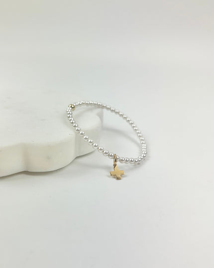 eGirl 3mm Pearl Signature Cross Charm Bracelet Bracelets in at Wrapsody