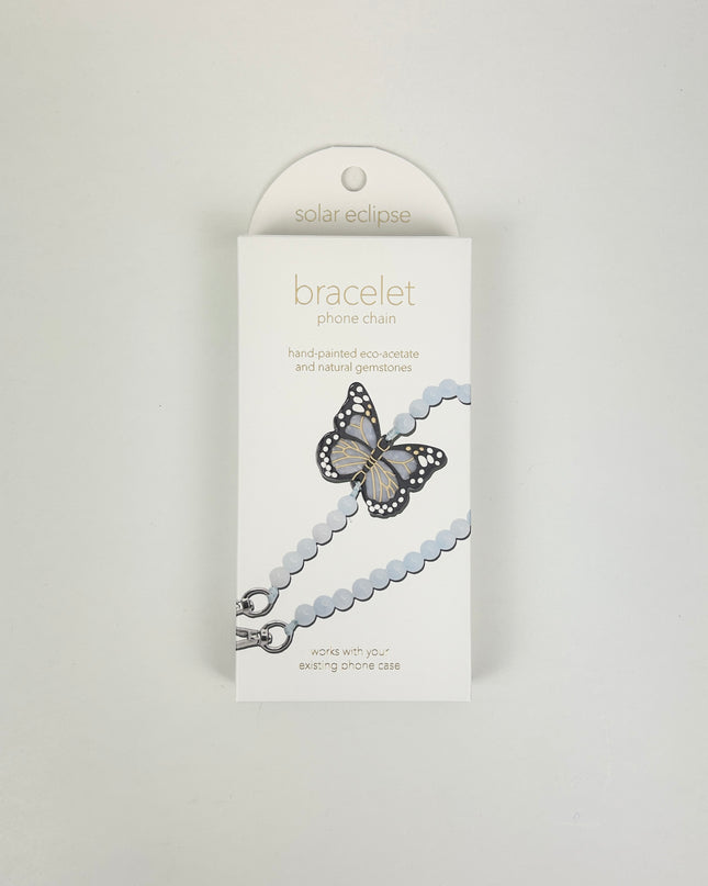 Solar Eclipse Monarch Butterfly Phone Chain Bracelet Travel Accessories in at Wrapsody