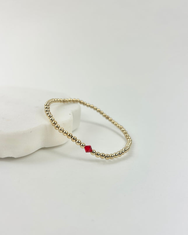 Beaded Blondes July Ruby Birthstone Bracelet Bracelets in at Wrapsody