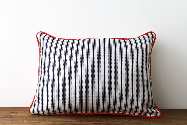 Auburn Pennant Pillow with Navy Piping Pillows in at Wrapsody