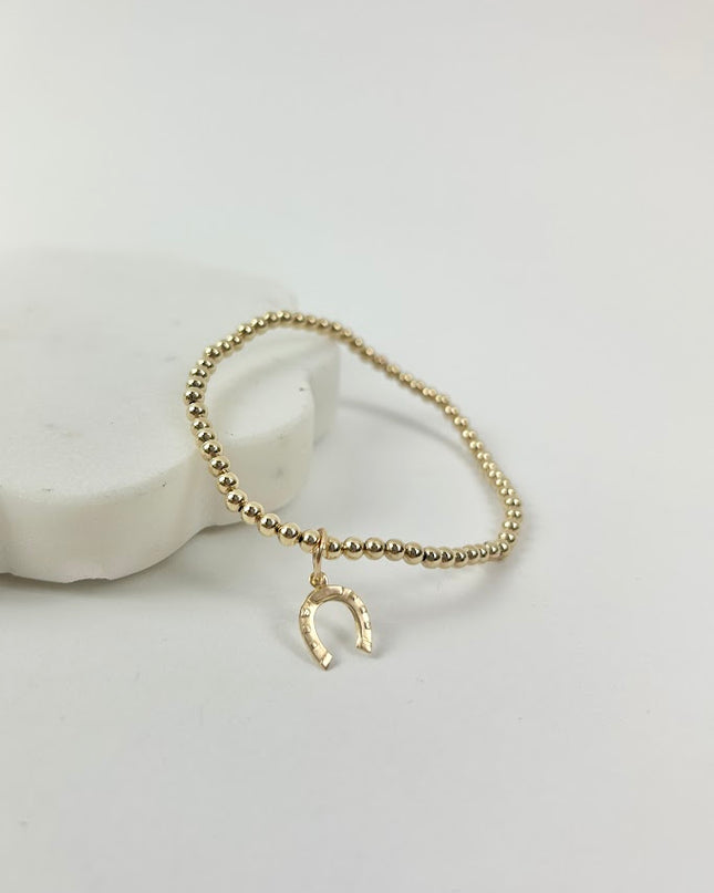 Beaded Blondes Horseshoe Charm Bracelet Bracelets in at Wrapsody