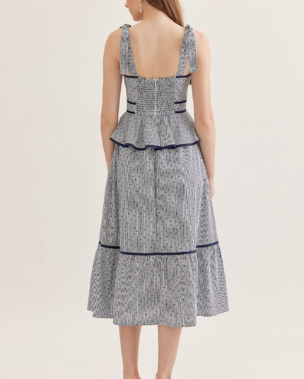 Floral Peplum Midi Dress in Navy Dresses in at Wrapsody