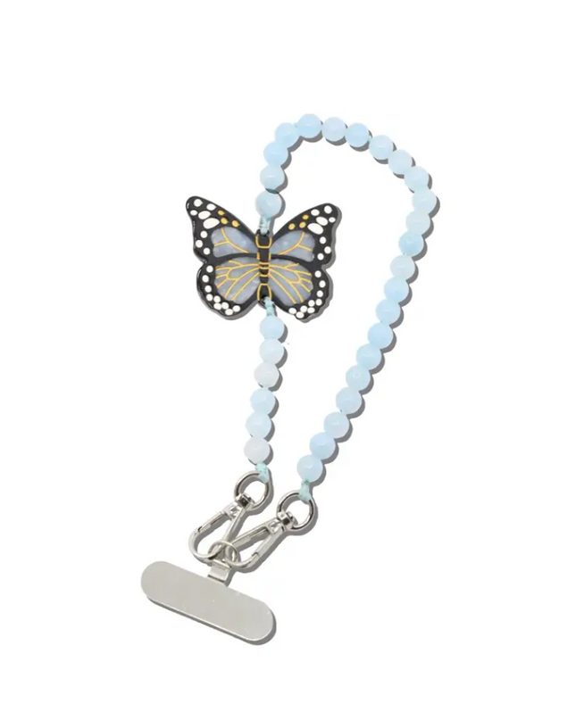 Solar Eclipse Monarch Butterfly Phone Chain Bracelet Travel Accessories in at Wrapsody