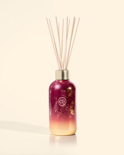 Capri Blue 8 oz Glim Reed Diffuser Scents in Tinsel & Spice at Wrapsody